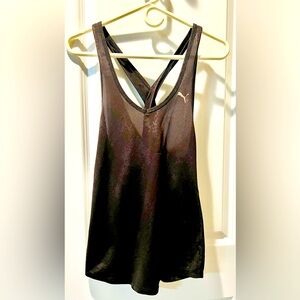 Women’s, puma, black mesh, loose fitting criss-cross back workout top.